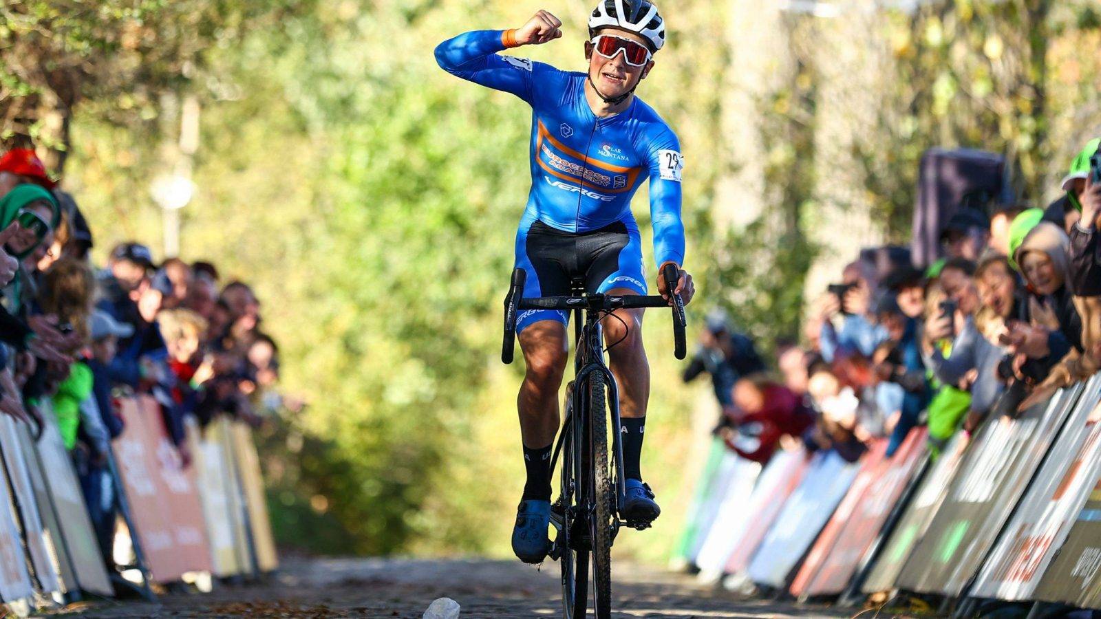 US Andrew August celebrates as he crosses the finish line to win the junior men's race during the Koppenbergcross, the first race (out of eight) of the X2O Badkamers trophy, in Melden, on Tuesday 01 November 2022. BELGA PHOTO DAVID PINTENS