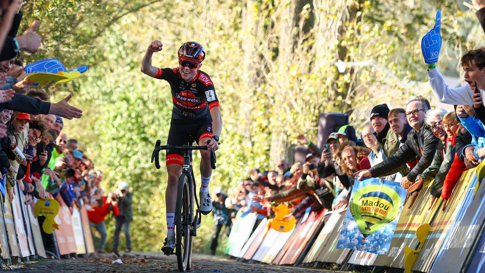 Dutch Fem Van Empel celebrates as she crosses the finish line to win the women's race during the Koppenbergcross, the first race (out of eight) of the X2O Badkamers trophy, in Melden, on Tuesday 01 November 2022. BELGA PHOTO DAVID PINTENS